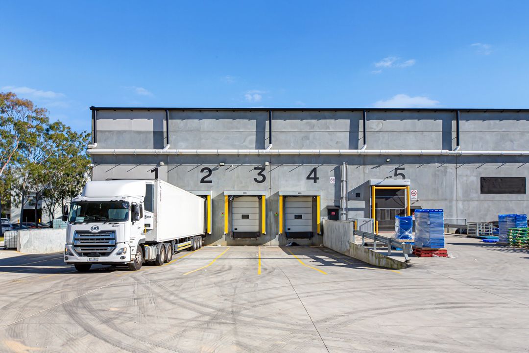 Yennora, Sydney — the numbered loading-dock face and a truck at dock 1